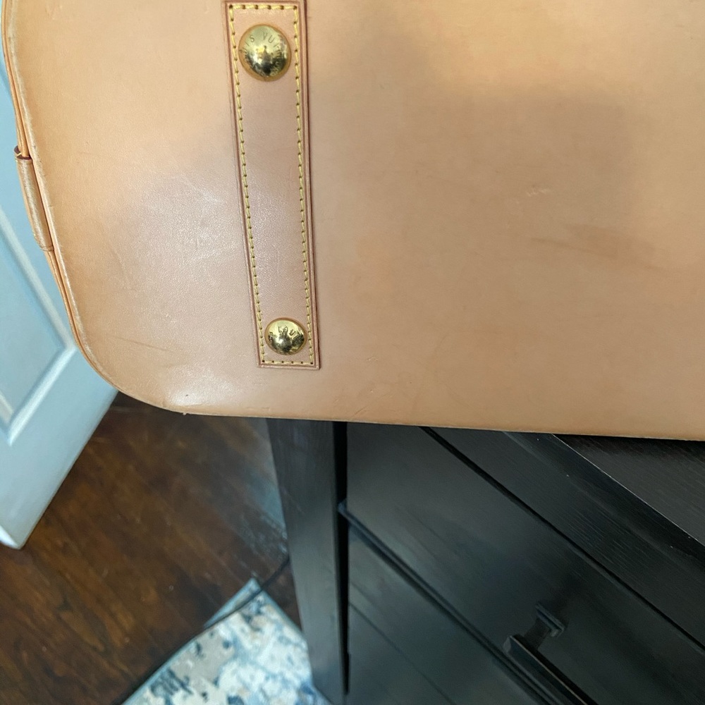 Woman’s Louis Vuitton Purse